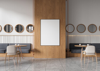 Cozy modern cafe interior with wooden accents, round mirrors, and minimalistic furniture setup, featuring a blank poster on the wall. 3D Rendering