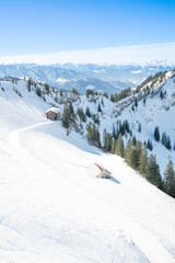 Snowy mountaintop chalet offers stunning Alps vista
