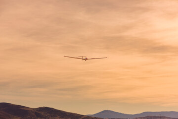 Glider Approaching Landing Over Mountains at Fuentemilanos Airfield, Spain