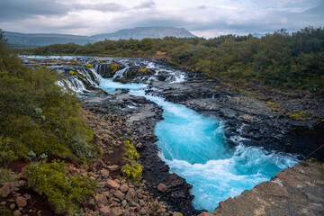 The stunning Bruarfoss blue waterfall in Iceland