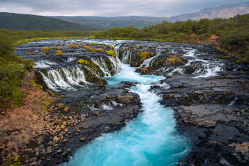Beautiful Bruarfoss waterfall with turquoise water in Iceland