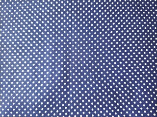 White dots patterns on navy fabric 