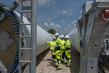 Wind Turbine Maintenance and Repair Technician, Engineer team professional working maintenance clean power generator system
