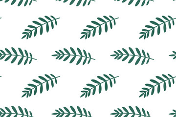 Obraz premium Green leaf pattern on a white background showcasing nature\'s beauty and seamless design