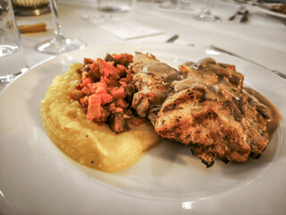 Grilled chicken legs with creamy mushroom sauce (with turmeric mashed potatoes and sautéed...