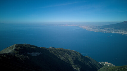 From the top of Monte Faito, in southern Italy, it is possible to admire a fantastic landscape in which mountain and coast merge: in the background Vesuvius, a volcano in southern Italy