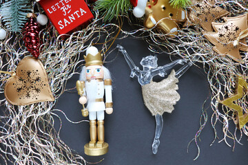 christmas card for children. ballerina and nutcracker figurine on christmas tree © Palanga