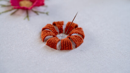 Picot Stitch in Progress: Needle Emerges from Fabric
