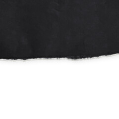 piece of torn black paper with ripped edges