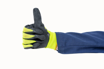 Shot of an handyman hand gesturing thumb up with yellow and dark black glove and isolated on white...