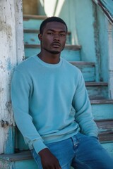Obraz premium Sunshine Editorial Shot of Model on LA Stairs in BlueGreen Attire