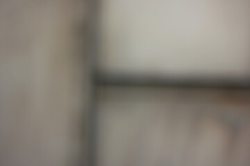 A dreamy view of a repeating pattern on a metal grid.