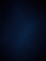 Fototapeta premium Deep blue night sky with sparkling stars on a black background, darkness, milky way, vastness