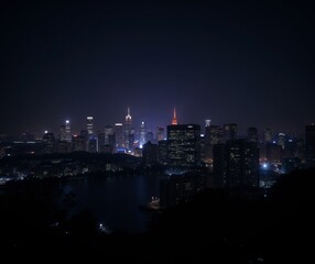 Obraz premium City skyline at night with uneven illumination and dark shadows