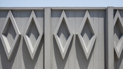 Obraz premium Sharp-edged Diamond Reliefs on Large Scale Wall Structure