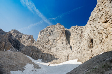 Exhilarating ascent to Pisciadu lake in the breathtaking Dolomites near Selva di Val Gardena amidst...