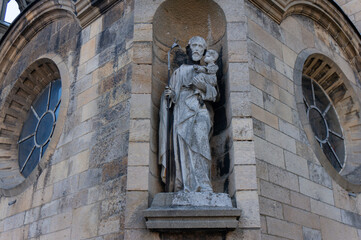 Statue of Saint with Child in niche of Church of Our Lady of the Scapular (kościół Matki Boskiej...