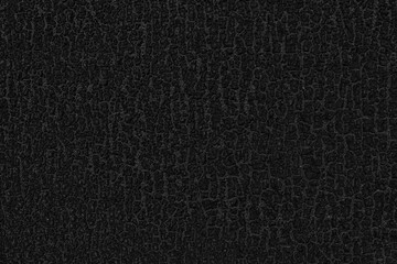Fototapeta premium Black, dark coarse grainy background. Black grainy texture