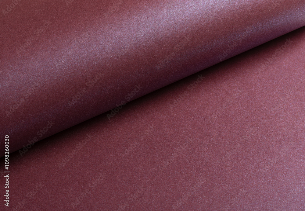 Poster metallic burgundy paper background with a smooth, shimmering surface and elegant folds. featuring a 
