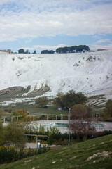 Pamukkale Travertines Cinematic Aerial Drone footage. Turkish famous white thermal bath with...