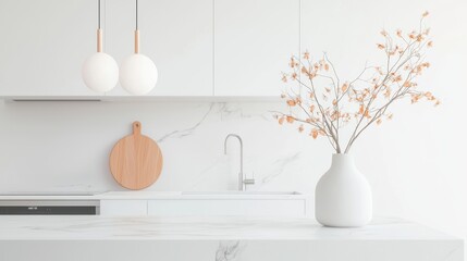 A modern kitchen with sleek white cabinets, stainless steel appliances, a marble countertop island, and pendant lights hanging above.