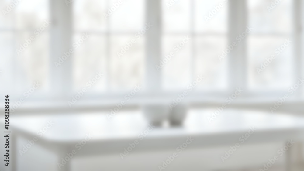 Poster blurred white table positioned in front of a large window with soft natural light