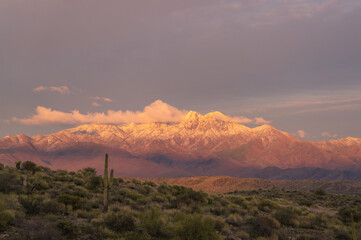 Obraz premium A snow-covered Four Peaks Mountain Range, in Arizona's Tonto National Forest. 