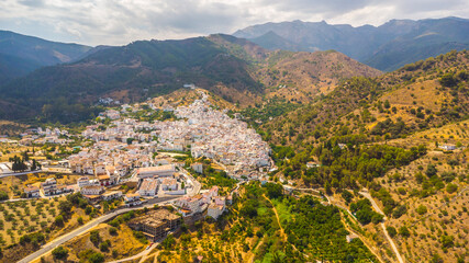 Aerial drone photo of the white village of Tolox in Spain