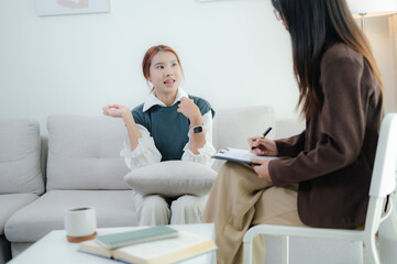 Psychology, depression. smile asian young woman, female patient mental explained symptom with...