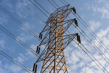 Power Lines. High-Voltage Electrical Tower. Transmission of Electricity. Metal High-voltage tower...