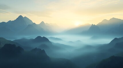Obraz premium Misty sunrise over majestic mountain range.