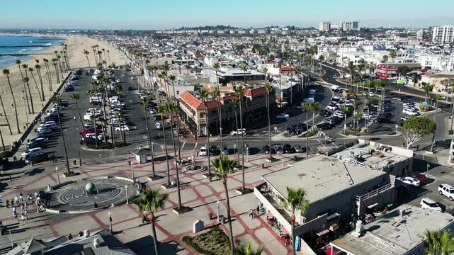 Newport Beach, California, November 20. 2024: New poer Beach, California, In Fall looking at kids at the piwe tht replaced the Mcfadden Wharf and the Pier Plaza from a UAV Drone