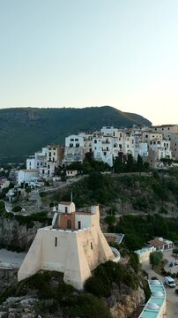 The village and port of Sperlonga, a tourist resort in Lazio. Italy.
Aerial view of the village perched on the hill overlooking the sea.