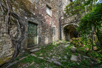 Fototapeta premium Summer image and architectural details of the medieval image of Cassagna, Liguria, Italy, Europe