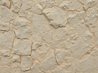 Obraz premium Rough and weathered stone surface with unique patterns and variations, perfect for backgrounds and design projects, projects, patterns