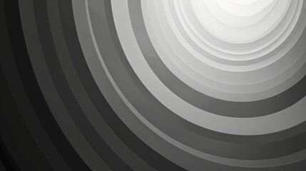 Obraz premium A grayscale gradient with a soft radial effect, creating a sense of depth and movement