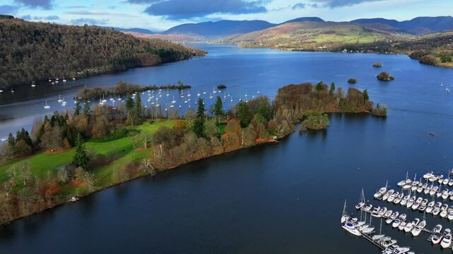 Aerial video showing Belle Isle in Wendemire Lake - Cumbria, UK. 