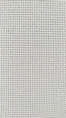 Close-up of a canvas texture with visible weave and rough surface, material, macro