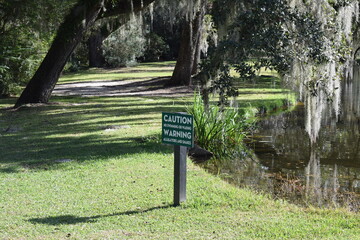 Alligator warning sign in the park
