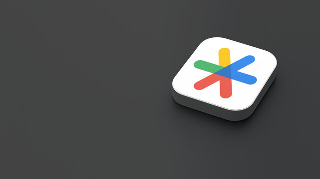3D-rendered icon of the Google Authenticator app logo, featuring a sleek, minimalistic design. The logo appears on a dark gray background within a white square with rounded corners.