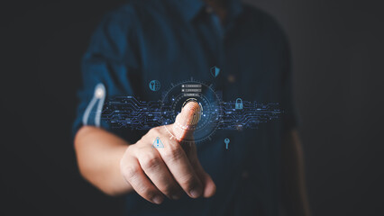 A person uses a futuristic digital interface with fingerprint scanning technology, representing cybersecurity, data authentication, and secure access.