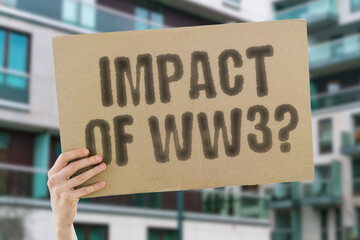The phrase 'Impact of WW3?' displayed on a banner held by a person. Future conflict and its...