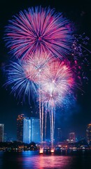 Brilliant Fireworks Illuminate the Night Sky Over a Bustling City Skyline, Celebrating a Festive Occasion With Bursts of Color and Excitement Against a Dark Backdrop