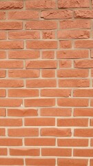 Fototapeta premium Close-up shot of red brick textured wall, showing rough and uneven surface with visible grout lines, rough, surface