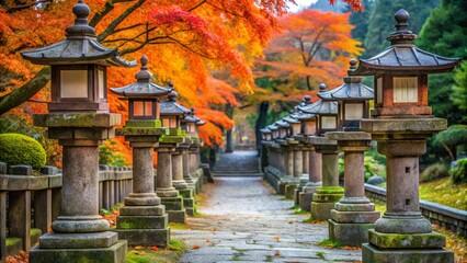 Obraz premium Traditional Japanese stone lanterns leading to the temple gate in autumn 
