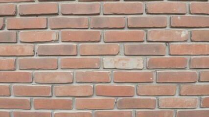 Obraz premium Close-up shot of a weathered brick wall with varying shades of red, brown, and grey, surface, design