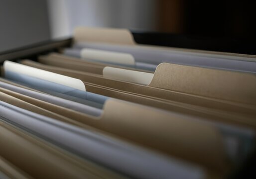 Archive files closeup representing data storage, organization, and efficient record keeping in a professional environment