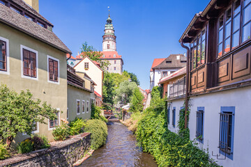 Old medieval street with water stream in Cesky Krumlov