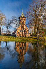 View of the old church in Wróblewo near Motlawa river