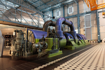 Monumental Steam Engine - An old steam engine with multiple pipes an impressive structure in an industrial hall